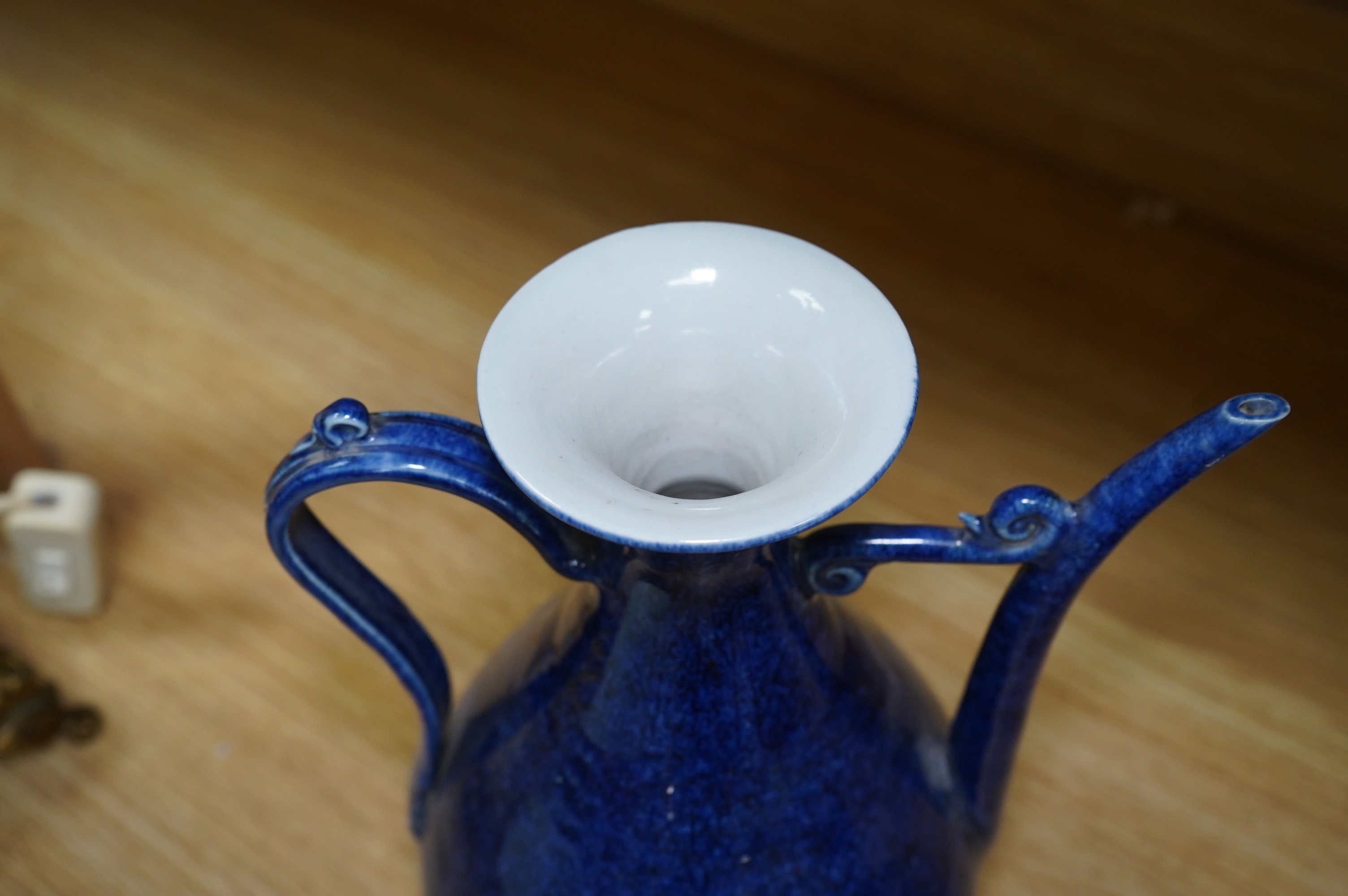 A Chinese porcelain powder blue ewer, 28cm high. Condition - good
